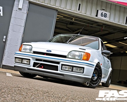 Low front left shot of a silver RWD Fiesta XR2i
