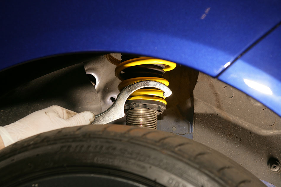 coilover adjustment on a car 