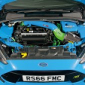 A central under the bonnet shot of a bright blue Ford Focus RS Mk3