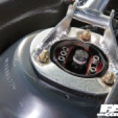 A close up of an engine part inside a BMW 3 Series E46