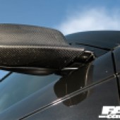 An underneath shot of the right side wing mirror of a BMW 3 Series E46
