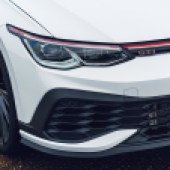 Close up of the front left headlight of a white VW Golf GTI Clubsport Mk8