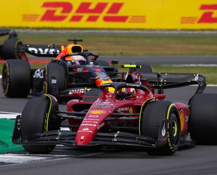 Carlos Sainz, Ferrari F1-75, leads Max Verstappen, Red Bull Racing RB18 during the British GP at Silverstone Circuit