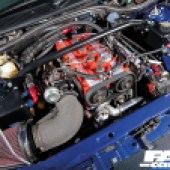 View from above of the Ford Cosworth YB engine fitted in bright blue car