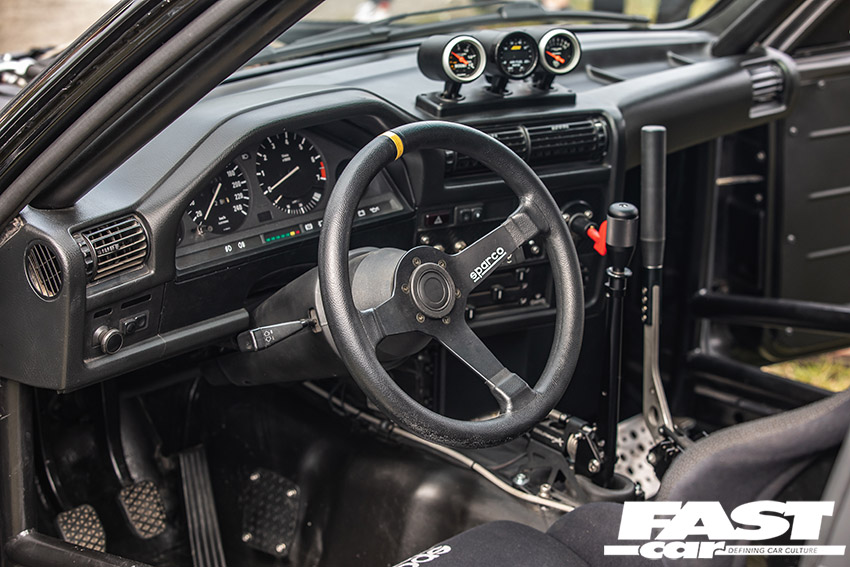 Interior shot with steering wheel on e30