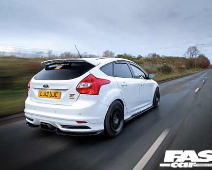 Modified Ford Focus ST Mk3 driving shot of the rear