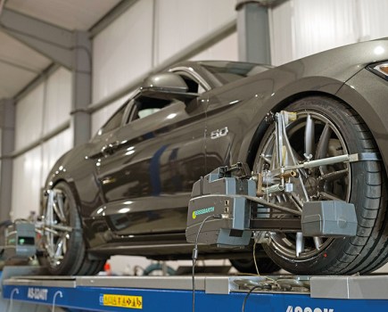 Ford Mustang getting wheel alignment - cheap tuning tips