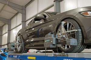 Ford Mustang getting wheel alignment - cheap tuning tips
