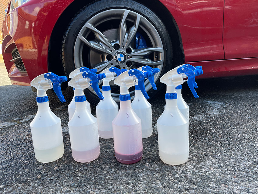 Products bottled into non-branded spray bottles ready for best alloy wheel cleaners test