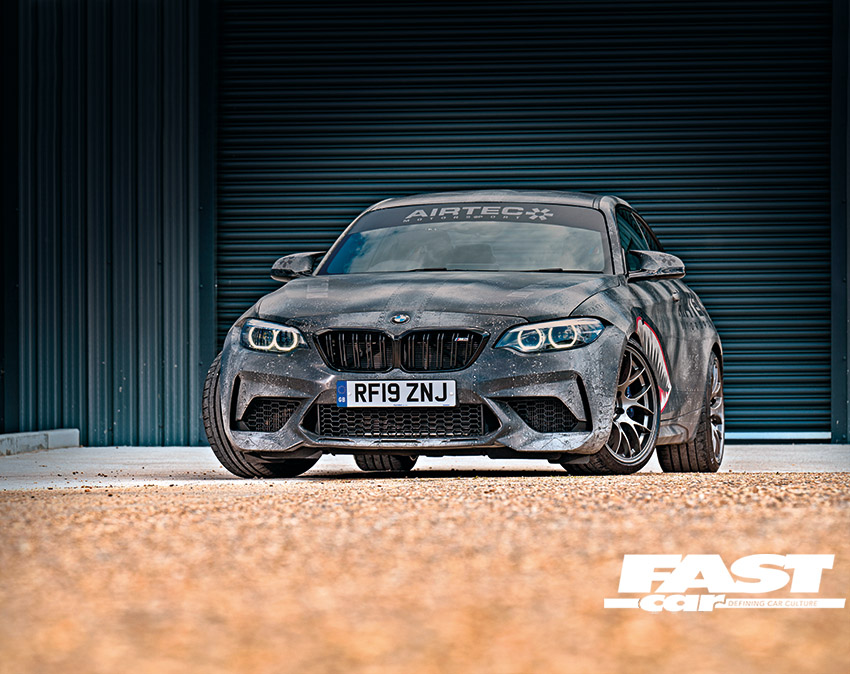 Front end shot of modified bmw m2 competition