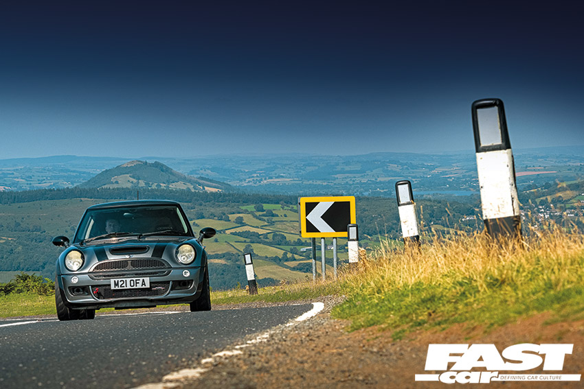 Driving shot on b-road of modified mini cooper s R53