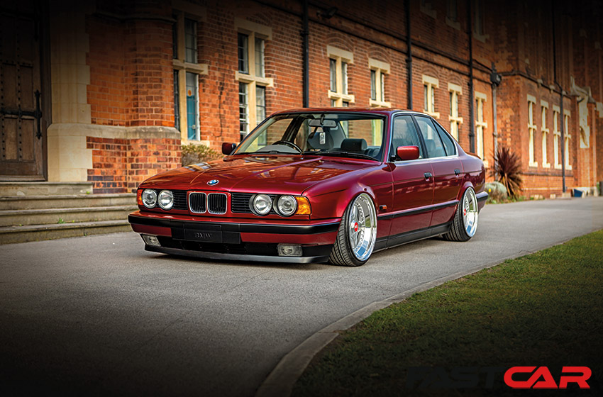 front 3/4 shot of bagged E34 BMW