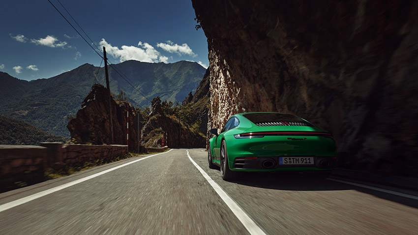Green rear shot of Porsche 992 911 Carrera T