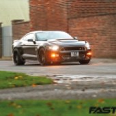 Driving shot of modified Shelby Mustang