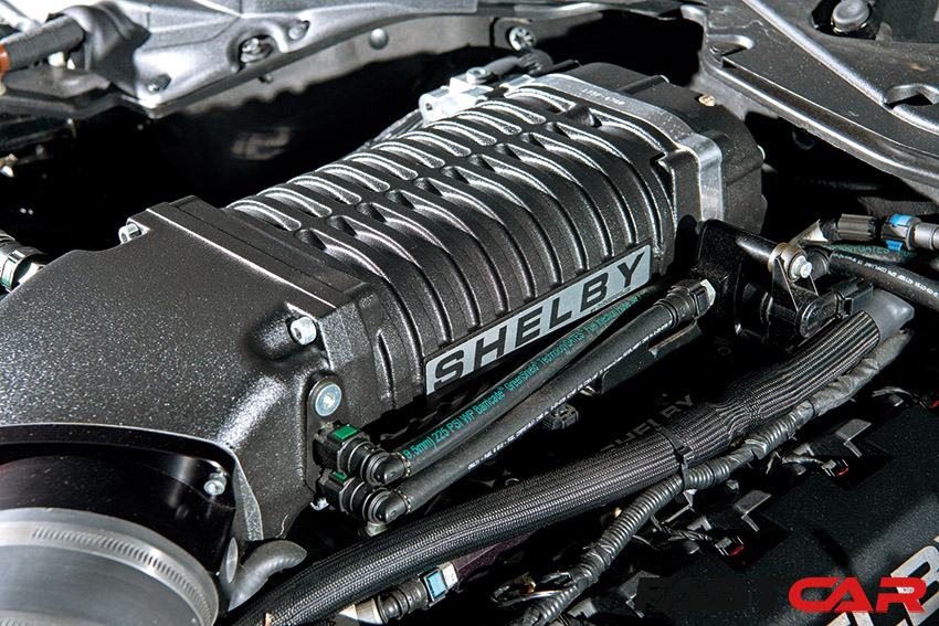 Supercharger on V8 engine in modified shelby mustang
