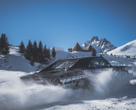 Alex and his 1968 dodge charger drifting in the snow