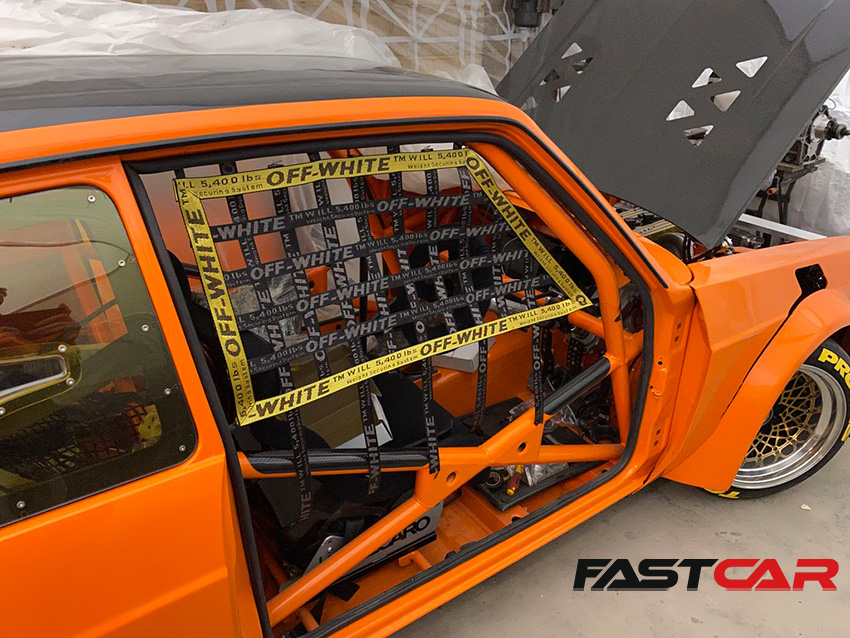Off-white window nets on modified Ford Escort Mexico