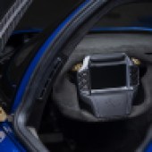 A detailed shot of the car's steering wheel.
