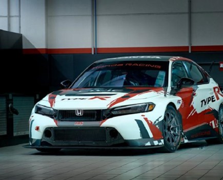 The new Honda Civic Type R TCR FL5 in a garage.