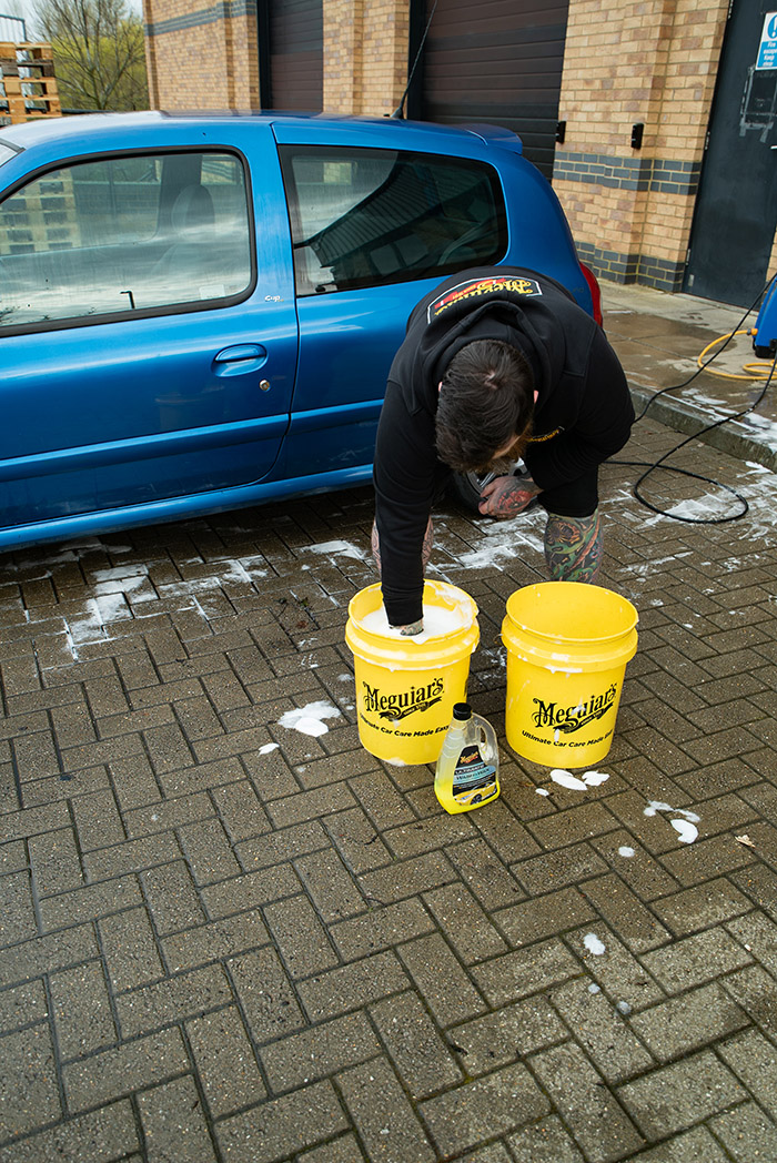 Grit guards and two buckets help reduce contaminants returning to paintwork