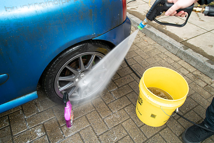 pressure washer cleaning off wheel cleaner 