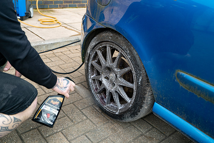 Spray the alloy wheels liberally with cleaner