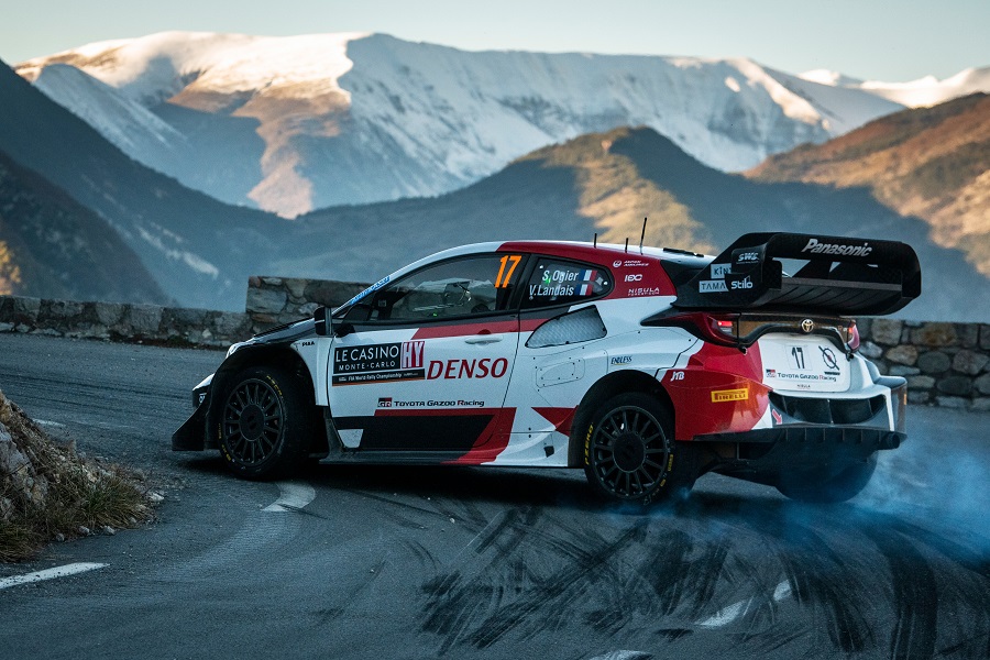 Seb Ogier sliding his Yaris around a hairpin at the 2023 Rallye Monte-Carlo.