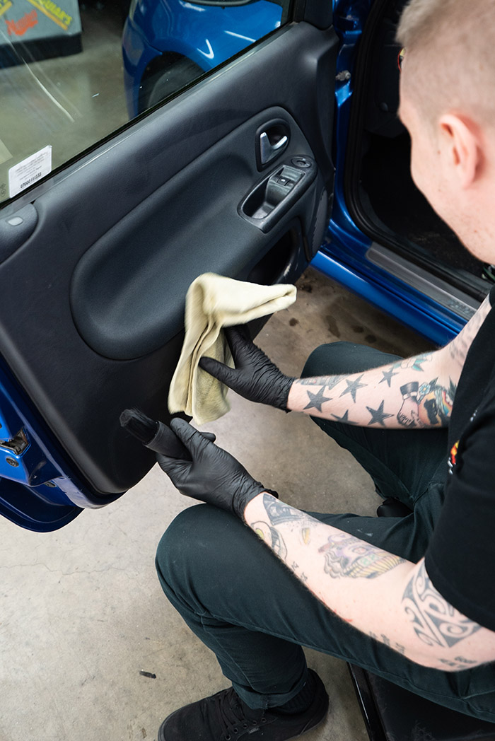 Wiping away access cleaner on your car's interior