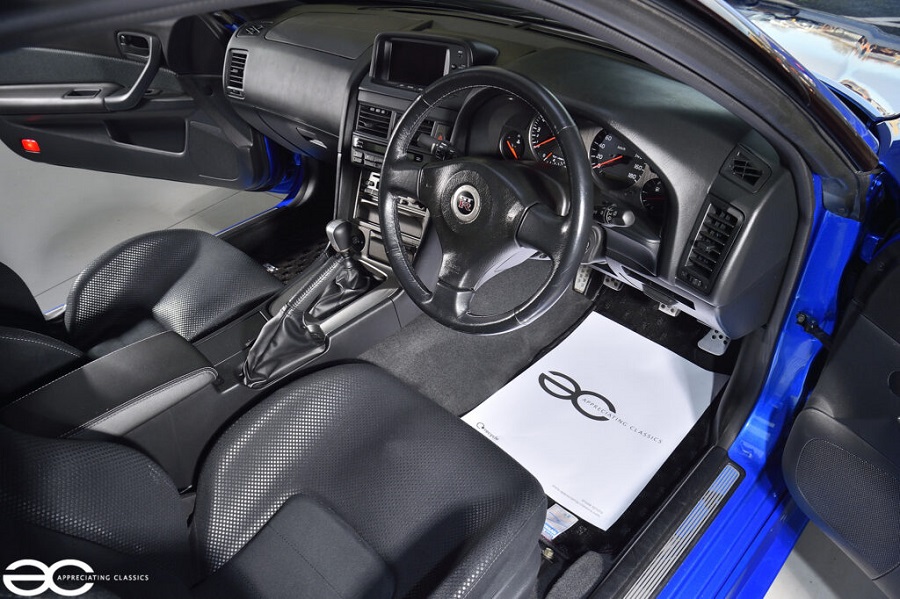 The interior of a Nissan Skyline GT-R R34.