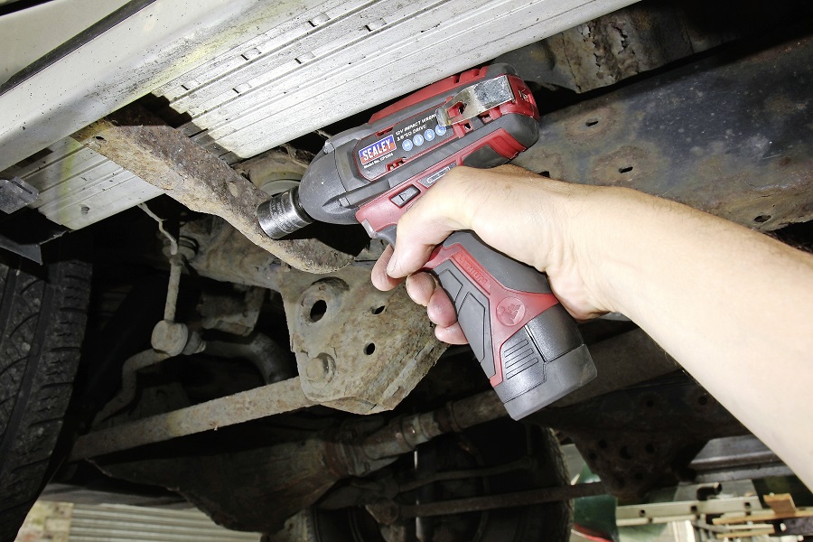 A Sealey impact driver being used.