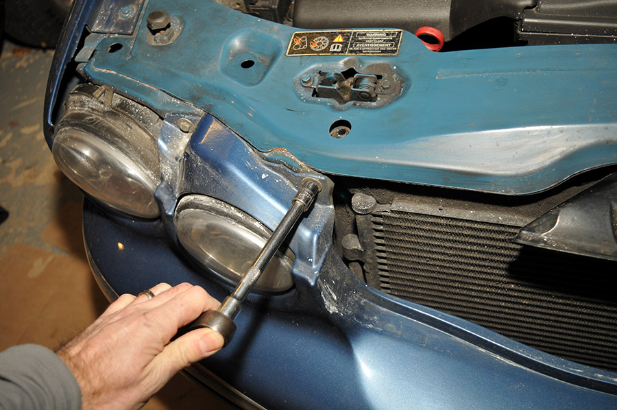 Jaguar headlights being removed