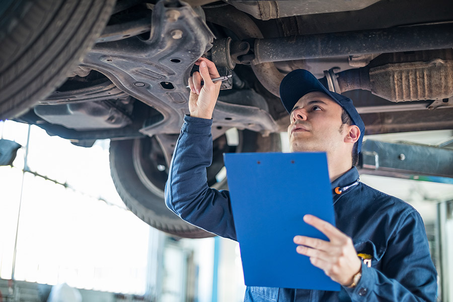 DVSA official undertaking an MOT