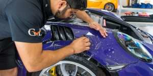 GVE applying Xpel paint protection film on Porsche
