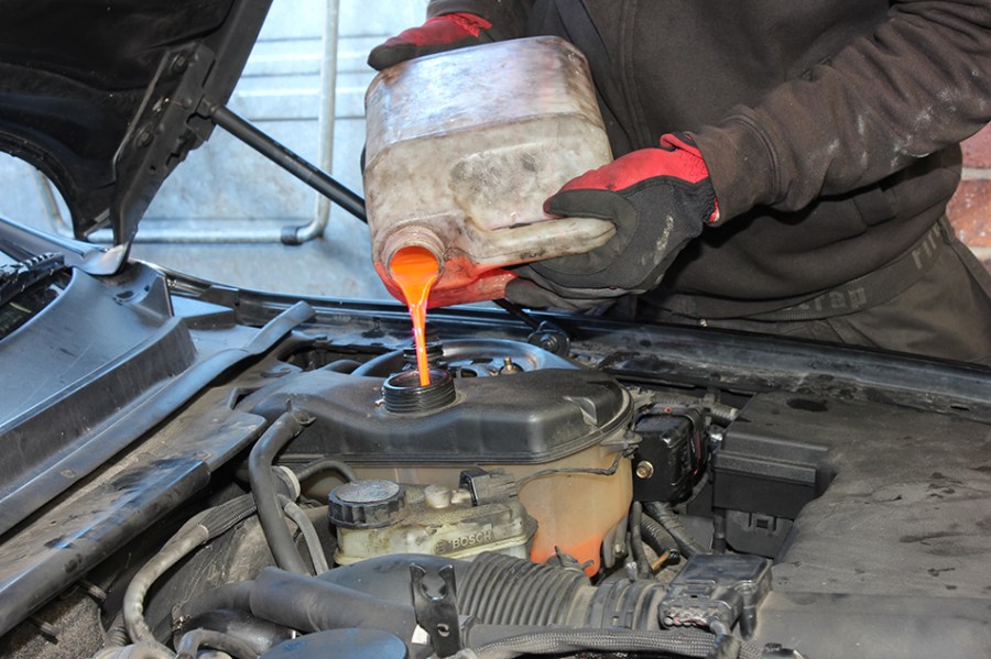 Topping up engine coolant