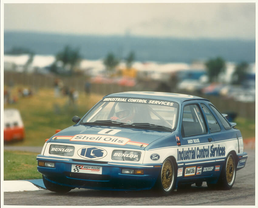 Andy Rouse racing a Merkur XR4Ti in the BTCC