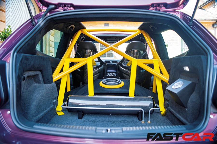 Roll cage and subwoofer in modified vw polo