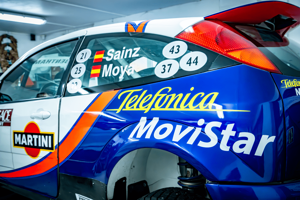 Side window of Focus WRC showing driver's names