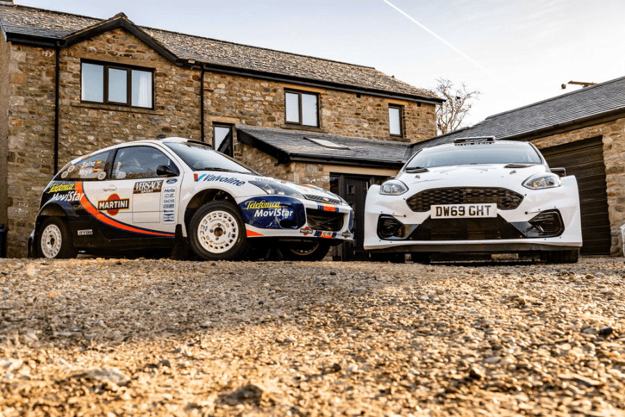 Focus WRC parked next to Fiesta Rally2 car