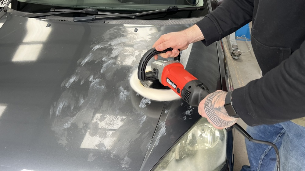 Polishing the bonnet of a car