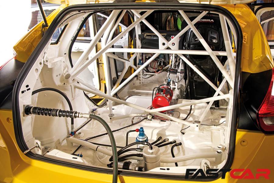 stripped interior with roll cage in mk3 ford focus race car 