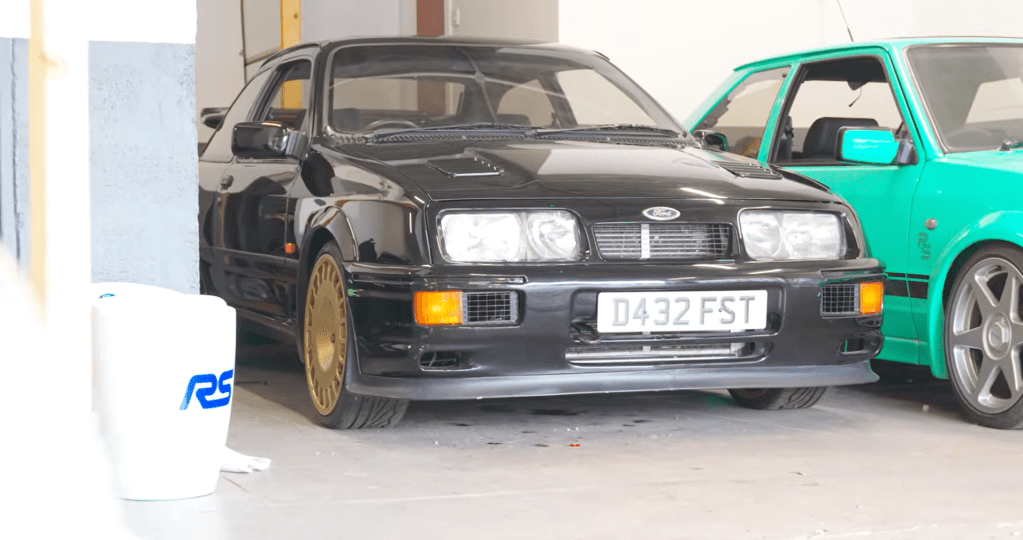 Modified Sierra RS Cosworth in a garage