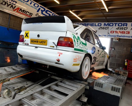 Escort Cosworth with flames coming from exhaust on a dyno