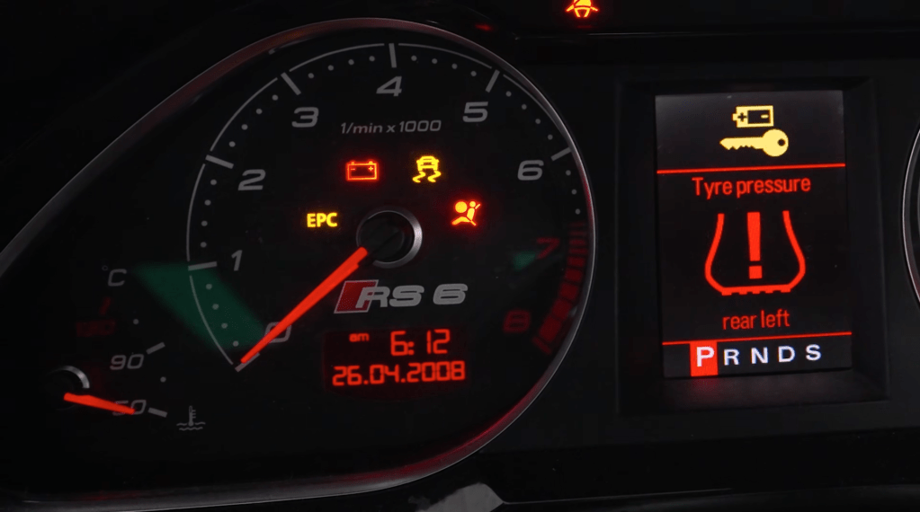 Audi RS6 dasd with many warning lights illuminated