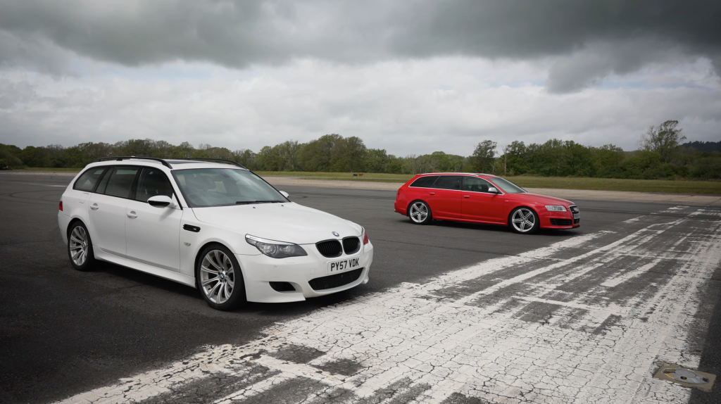 Audi RS6 lines up alongside BMW M5 for a drag race