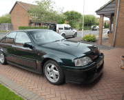 Lotus Carlton parked on a driveway on residential estate