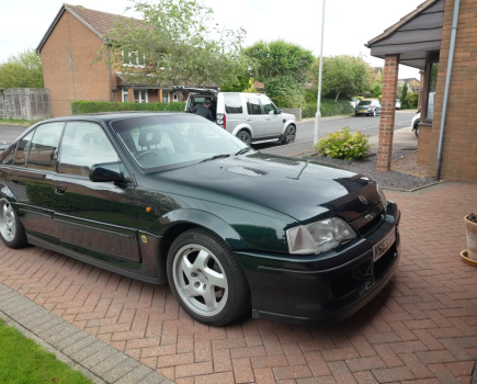 Lotus Carlton parked on a driveway on residential estate