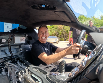 Mark McCann smiling after taking his rebuilt Bugatti Veyron for a first test drive