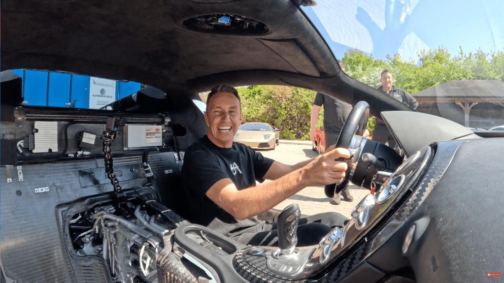 Mark McCann smiling after taking his rebuilt Bugatti Veyron for a first test drive