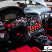 The red and black dash dials of a Rotor Mazda RX 7