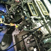 A close up engine shot of a blue Ford Fiesta